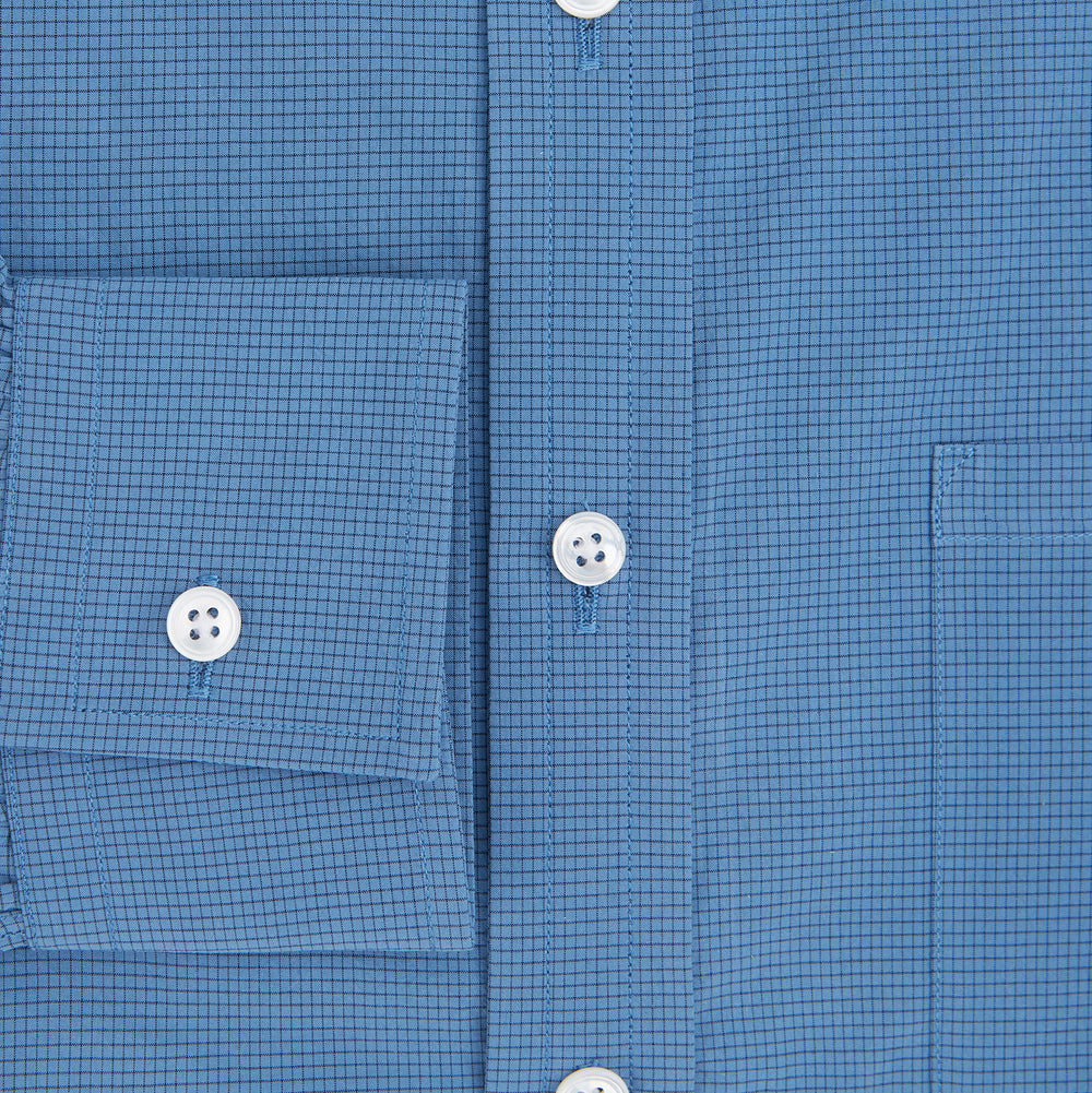 Turnbull & Asser UK SHIRTS WF DERBY COLLAR 1BC 1PKT COLNY BLU/ NVY CHK long-sleeved navy check button-down shirt with a collar, a single chest pocket, and a subtle pattern.