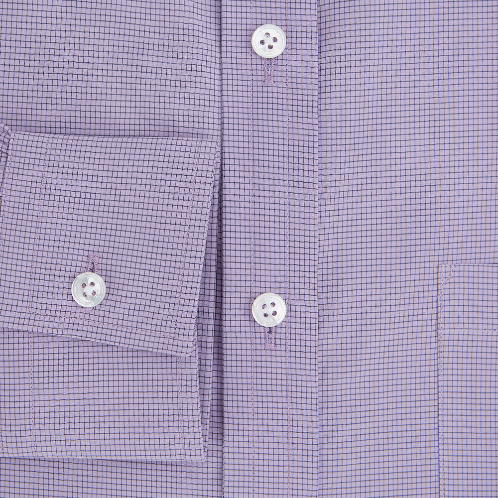 Turnbull & Asser UK SHIRTS WF DERBY COLLAR 1BC 1PKT BABY PINK/NAVY CHK long-sleeved shirt featuring a baby pink and navy check pattern, a button-down front, a single chest pocket, and button cuffs.