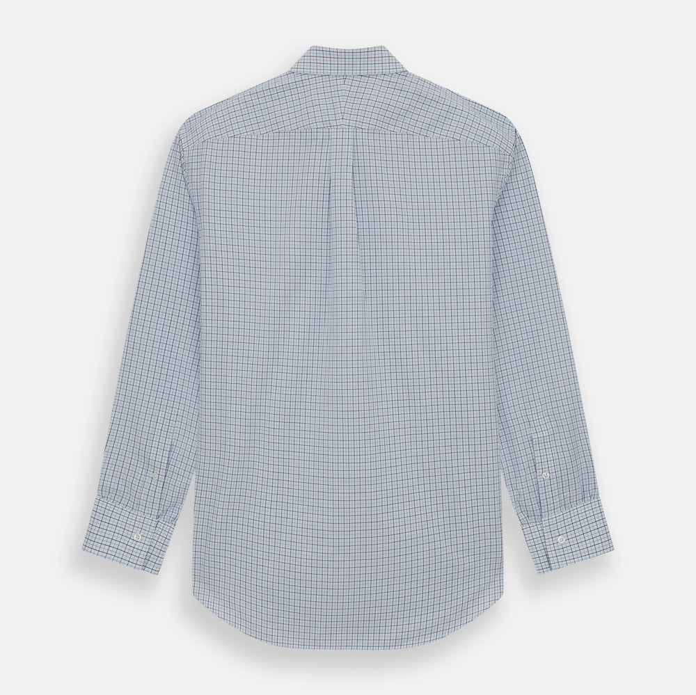The Turnbull & Asser Blue Double Graph Check Richmond Shirt features a light blue and white check pattern, front pocket, Derby collar, buttoned cuffs, and long sleeves, shown laid flat on a white background.