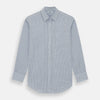 View 1 of product The Turnbull & Asser Blue Double Graph Check Richmond Shirt features a light blue and white check pattern, front pocket, Derby collar, buttoned cuffs, and long sleeves, shown laid flat on a white background.