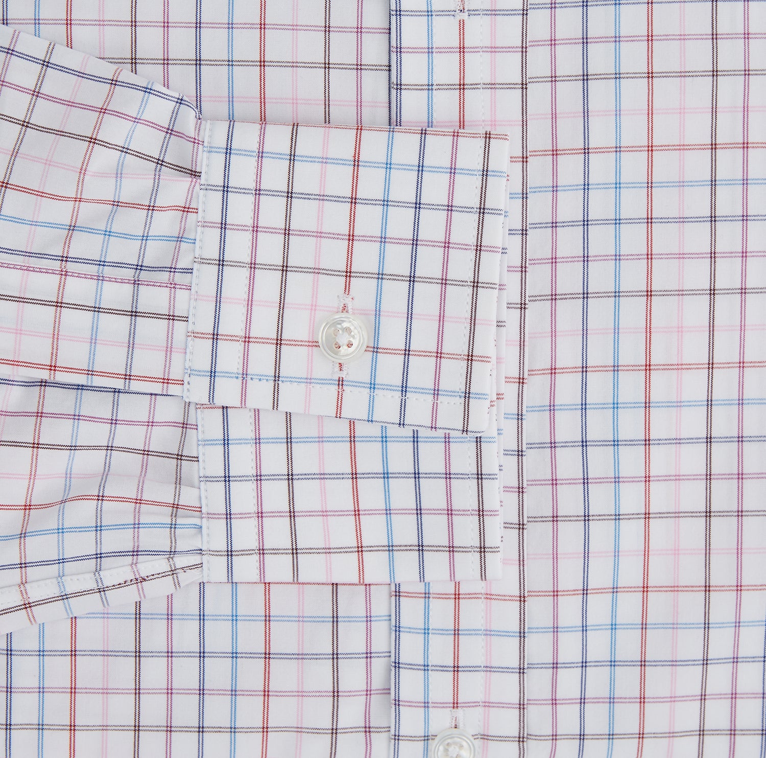 View 3 of product The Turnbull & Asser Multi Graph Check Richmond Shirt features a white base with red and blue checks, a Dorset button-down collar, and long sleeves. The shirt is displayed neatly on a plain white background.