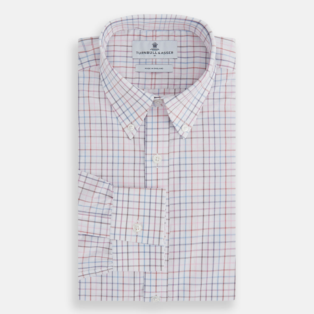 The Turnbull & Asser Multi Graph Check Richmond Shirt features a white base with red and blue checks, a Dorset button-down collar, and long sleeves. The shirt is displayed neatly on a plain white background.