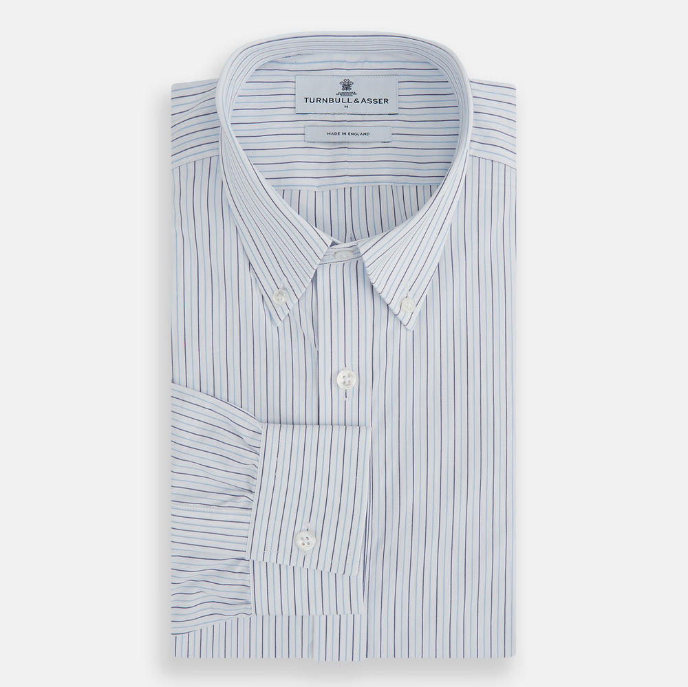 The Blue Double Pinstripe Richmond Shirt by Turnbull & Asser, featuring long sleeves, buttoned cuffs, and a button-down collar, is laid flat on a white background.