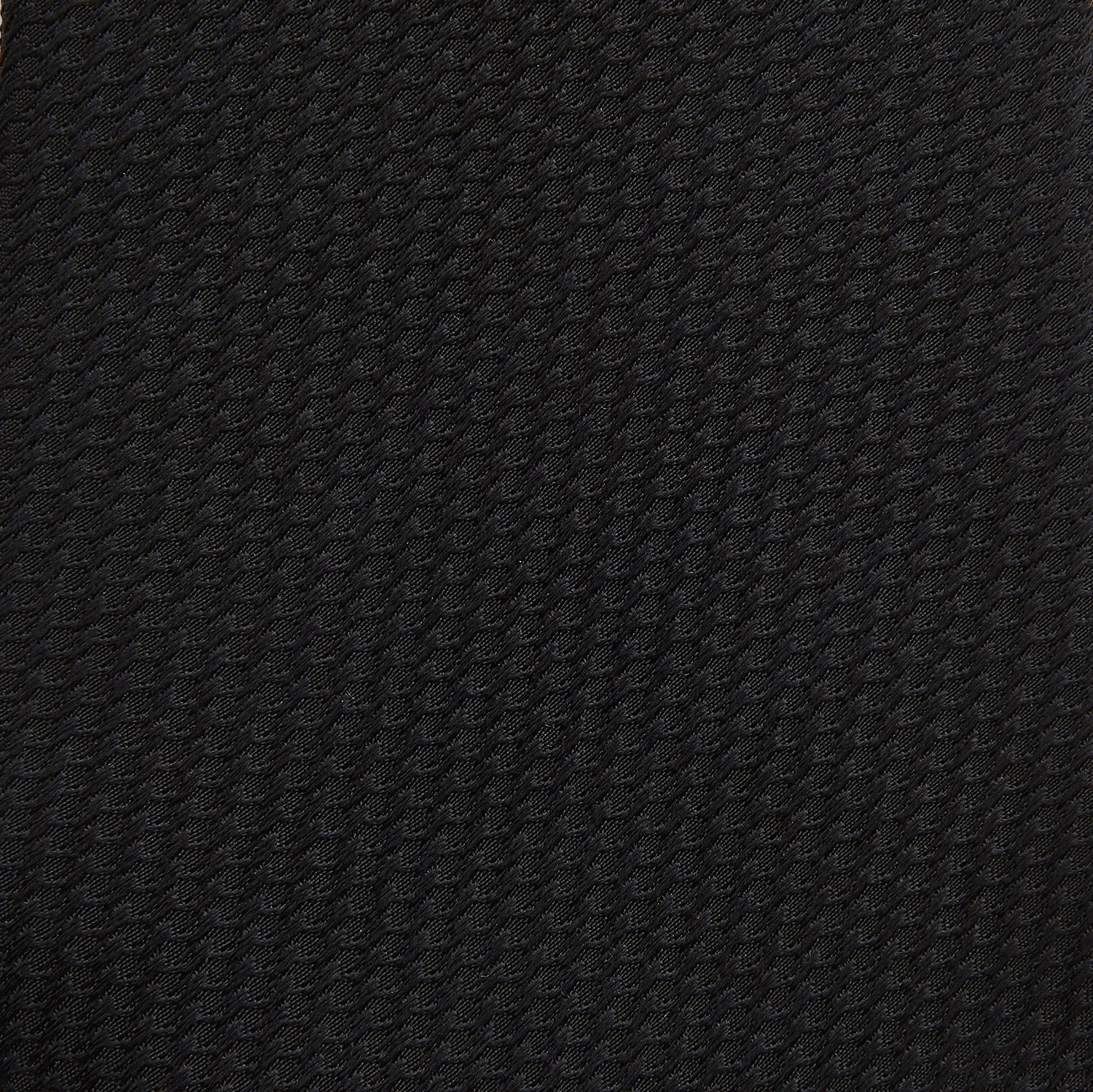 View 3 of product The Turnbull & Asser Black Lace Silk Tie, featuring a refined texture, is elegantly displayed on a white background.