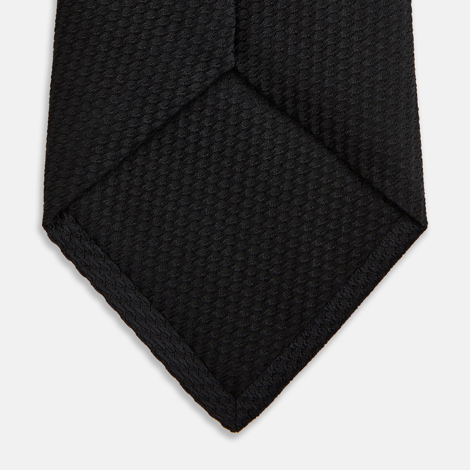 View 4 of product The Turnbull & Asser Black Lace Silk Tie, featuring a refined texture, is elegantly displayed on a white background.