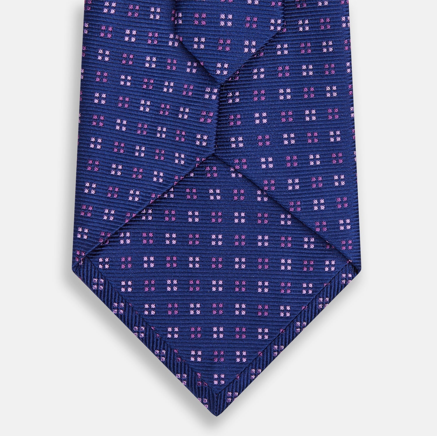 View 3 of product The Turnbull & Asser Blue and Pink Multi Dot Silk Tie, featuring a refined dot pattern, is displayed on a white background—an elegant accessory perfect for modern office style.
