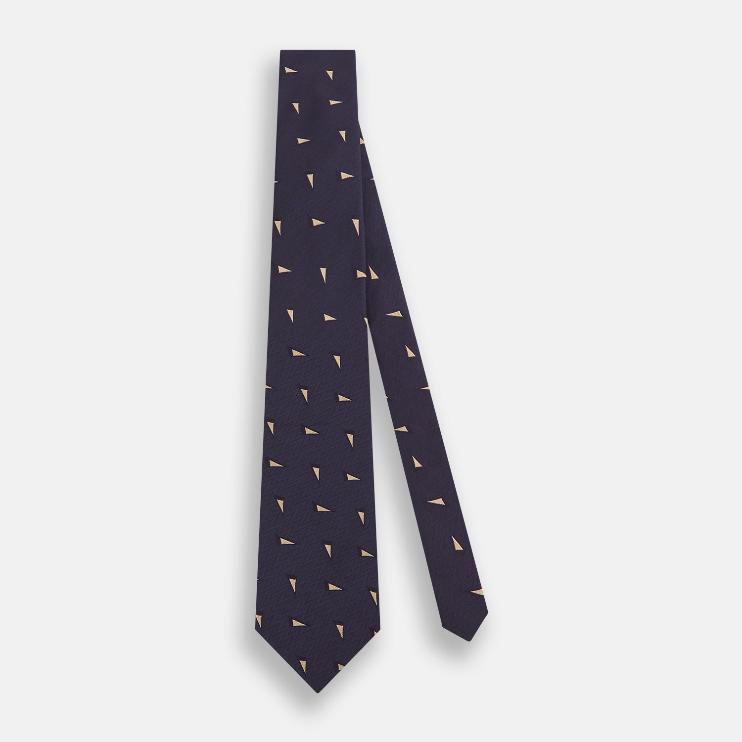 View 2 of product The Navy Triangle Silk Tie by Turnbull & Asser features an elegant gold micro triangle pattern on navy silk, making it a sophisticated accessory that pairs perfectly with Turnbull & Asser shirts.