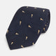 The Navy Triangle Silk Tie by Turnbull & Asser features an elegant gold micro triangle pattern on navy silk, making it a sophisticated accessory that pairs perfectly with Turnbull & Asser shirts.