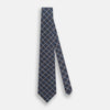View 2 of product The Turnbull & Asser Navy Fine Double Check Silk Tie, featuring a refined navy, light blue, and tan plaid, is neatly rolled on a white background—an ideal accessory to complement any Turnbull & Asser shirt.