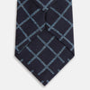 View 3 of product The Blue Diagonal Check Silk Blend Tie by Turnbull & Asser features a navy and light blue check pattern—a crisp accent for your favorite shirts.