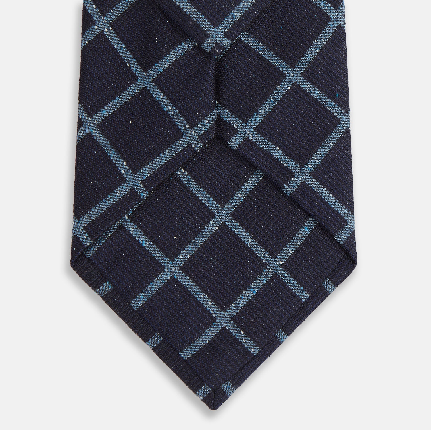 View 3 of product The Blue Diagonal Check Silk Blend Tie by Turnbull & Asser features a navy and light blue check pattern—a crisp accent for your favorite shirts.