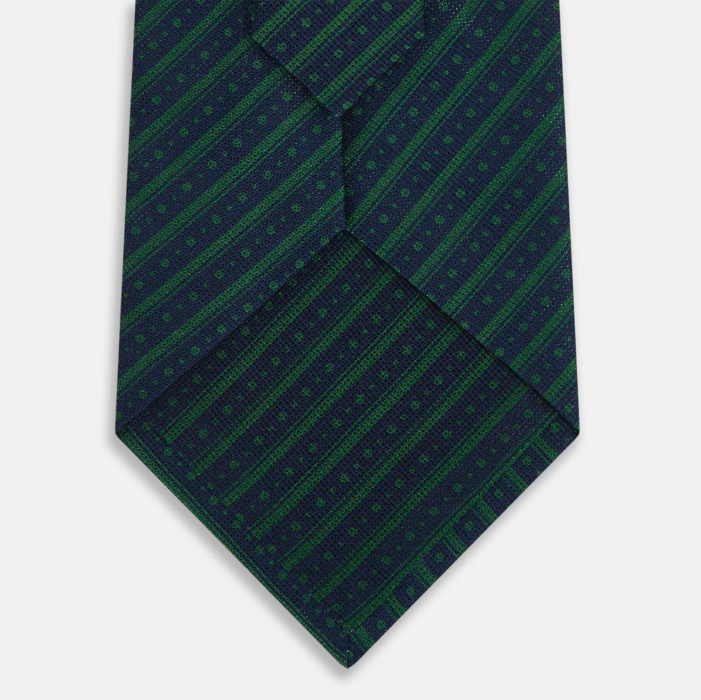 The Forest Green Beaded Ticking Stripe Silk Tie by Turnbull & Asser UK features diagonal blue stripes and is elegantly displayed on a plain white background.