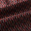 View 4 of product Close-up of the Red Hatched Mosaic Printed Silk Cravat by Turnbull & Asser UK, featuring black and white geometric shapes, parallel lines, and a textured finish in a classic British style.