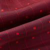 View 4 of product The Tulip Red Concentric Diamond Printed Silk Cravat from Turnbull & Asser UK features a bold red and black geometric pattern, creating an optical illusion effect and smart British style.