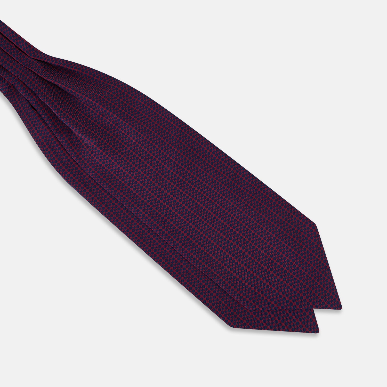 View 3 of product The Burgundy Micro-Dot Bar Printed Silk Cravat by Turnbull & Asser UK features a British style with a navy background, vertical red dots, and diagonal burgundy and navy stripes.