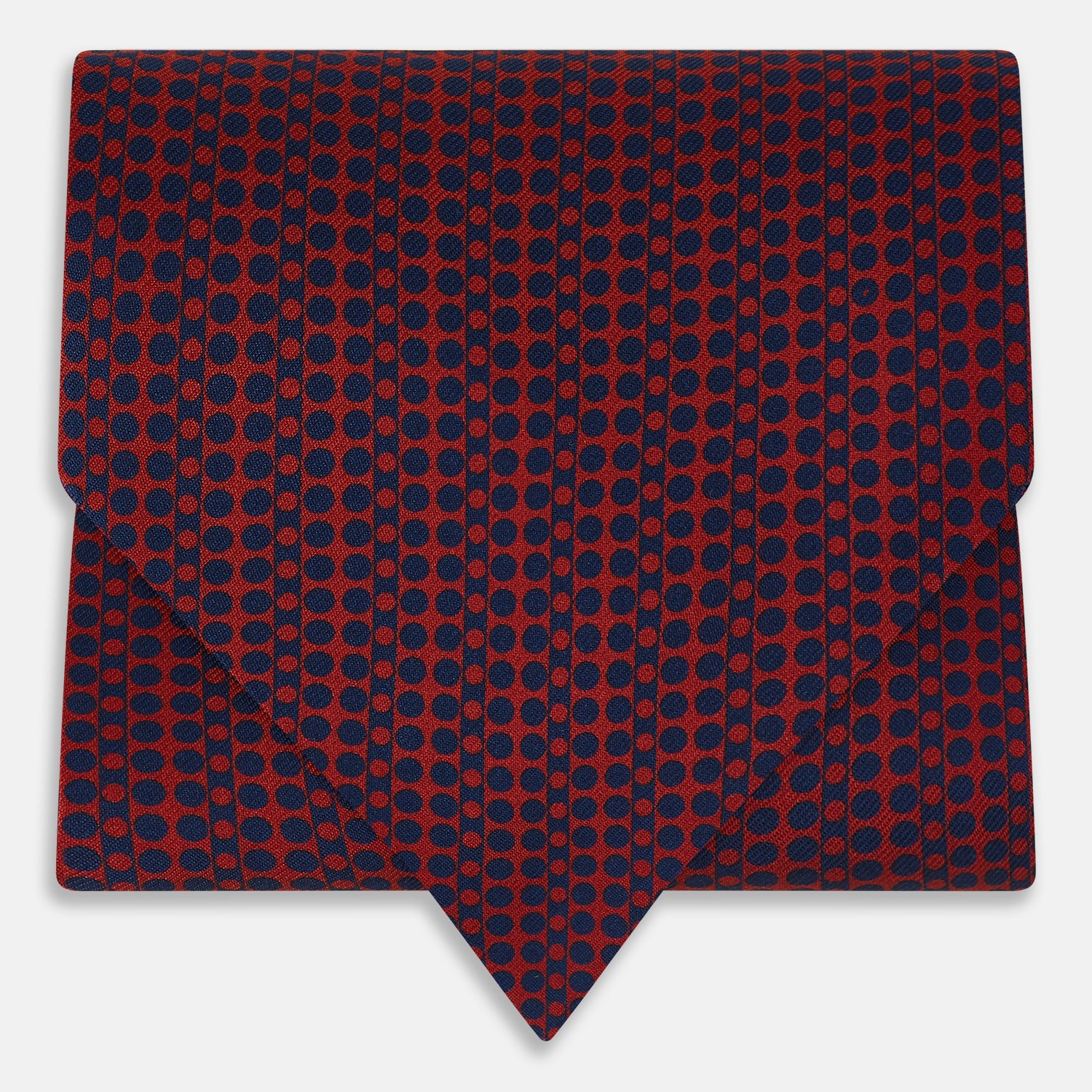 View 1 of product The Red Micro-Dot Bar Printed Silk Cravat from Turnbull & Asser UK features a geometric red and navy micro-dot pattern—a refined accessory inspired by classic British style, perfect for elegant weddings.