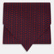 The Red Micro-Dot Bar Printed Silk Cravat from Turnbull & Asser UK features a geometric red and navy micro-dot pattern—a refined accessory inspired by classic British style, perfect for elegant weddings.