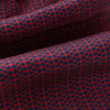 View 4 of product The Red Micro-Dot Bar Printed Silk Cravat from Turnbull & Asser UK features a geometric red and navy micro-dot pattern—a refined accessory inspired by classic British style, perfect for elegant weddings.