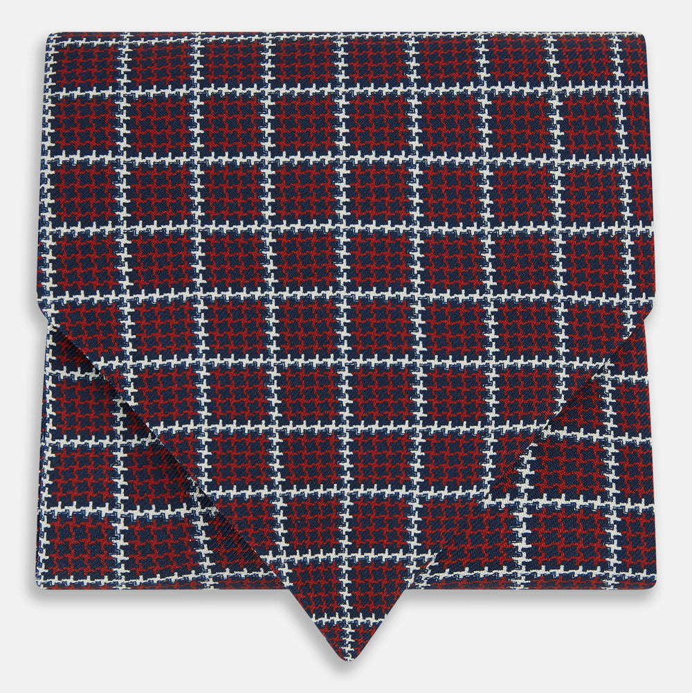 Turnbull & Asser UK Houndstooth Red Ascot Tie in Silk, featuring a folded design in red and navy houndstooth with a white grid overcheck.