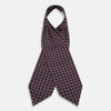View 2 of product Turnbull & Asser UK Houndstooth Red Ascot Tie in Silk, featuring a folded design in red and navy houndstooth with a white grid overcheck.