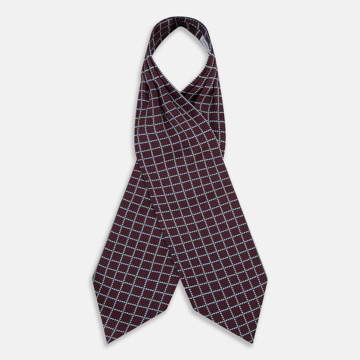 View 2 of product Turnbull & Asser UK Houndstooth Red Ascot Tie in Silk, featuring a folded design in red and navy houndstooth with a white grid overcheck.