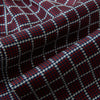 View 4 of product Turnbull & Asser UK Houndstooth Red Ascot Tie in Silk, featuring a folded design in red and navy houndstooth with a white grid overcheck.