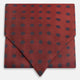 The Turnbull & Asser Red Dot Silk Cravat is a red silk accessory with evenly spaced dark blue polka dots—neatly folded for a sharp finish and perfect for pairing with your favorite handmade neckwear.