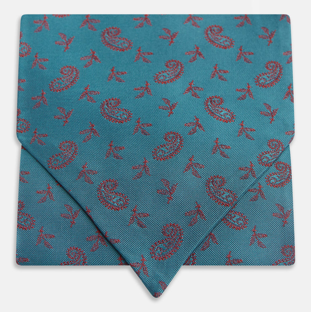 The Turnbull & Asser Teal Paisley Silk Cravat features a refined red paisley and floral pattern, adding a touch of elegance to formal men's attire.