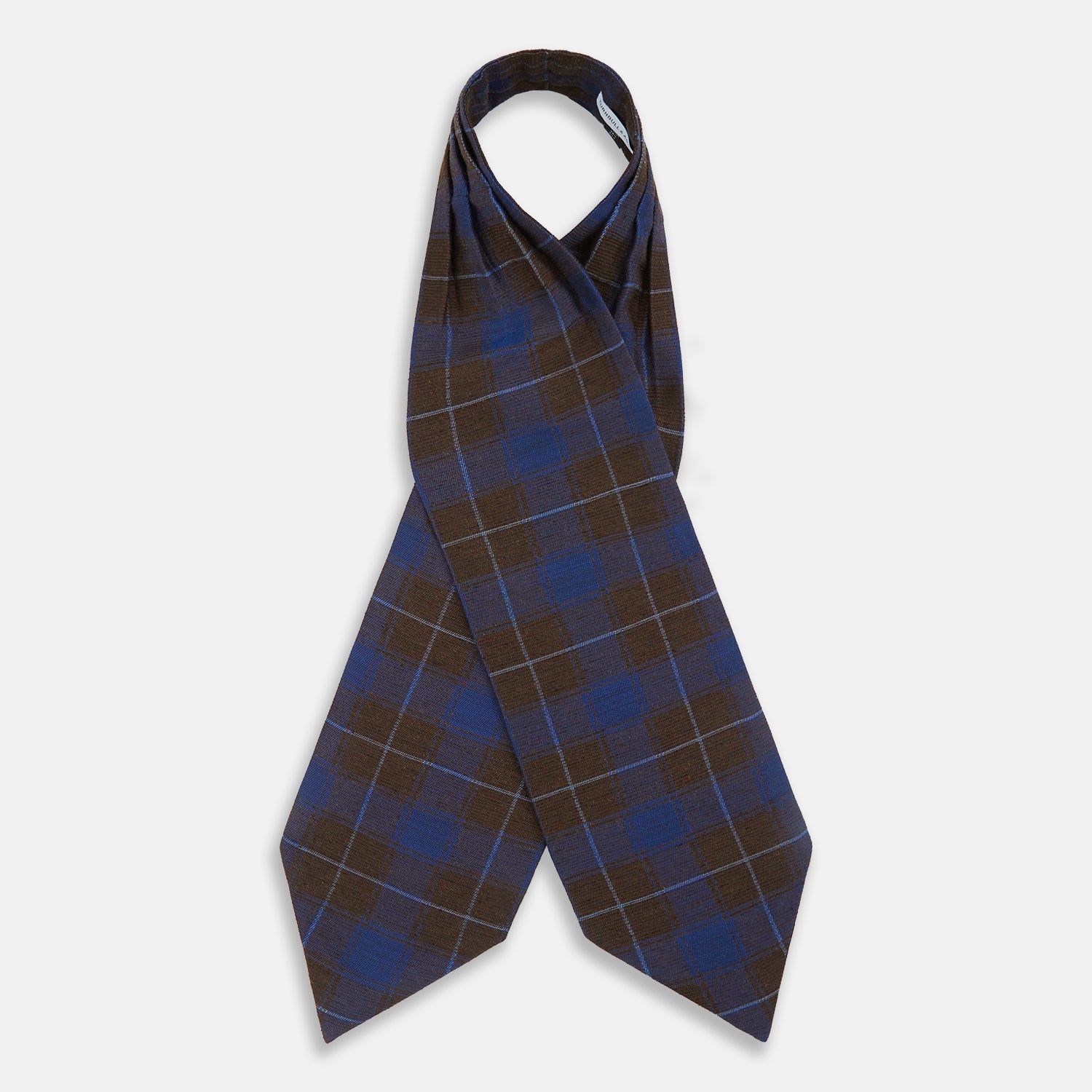 View 2 of product The Turnbull & Asser Blue and Brown Tartan Silk Blend Cravat is neatly folded with sharp creases and displayed on a white background.