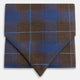 The Turnbull & Asser Blue and Brown Tartan Silk Blend Cravat is neatly folded with sharp creases and displayed on a white background.