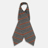 View 2 of product The Red Block Stripe Silk Cravat by Turnbull & Asser features gray textured fabric with two bold red-orange stripes and a pointed tip, reminiscent of handmade neckwear, shown against a white background.