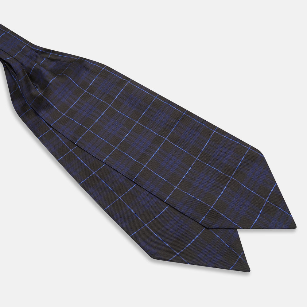 Pair the Turnbull & Asser Green Tartan Silk Cravat with a pocket square in a dark plaid of blue and black—a sharp, pointed accent that perfectly complements formal neckwear.