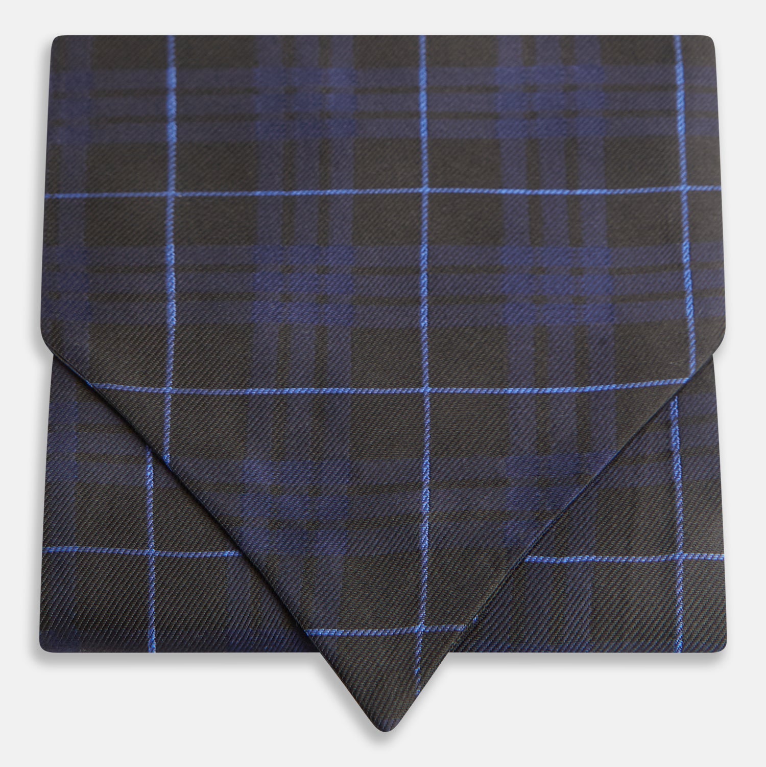 View 1 of product Pair the Turnbull & Asser Green Tartan Silk Cravat with a pocket square in a dark plaid of blue and black—a sharp, pointed accent that perfectly complements formal neckwear.