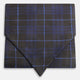 Pair the Turnbull & Asser Green Tartan Silk Cravat with a pocket square in a dark plaid of blue and black—a sharp, pointed accent that perfectly complements formal neckwear.