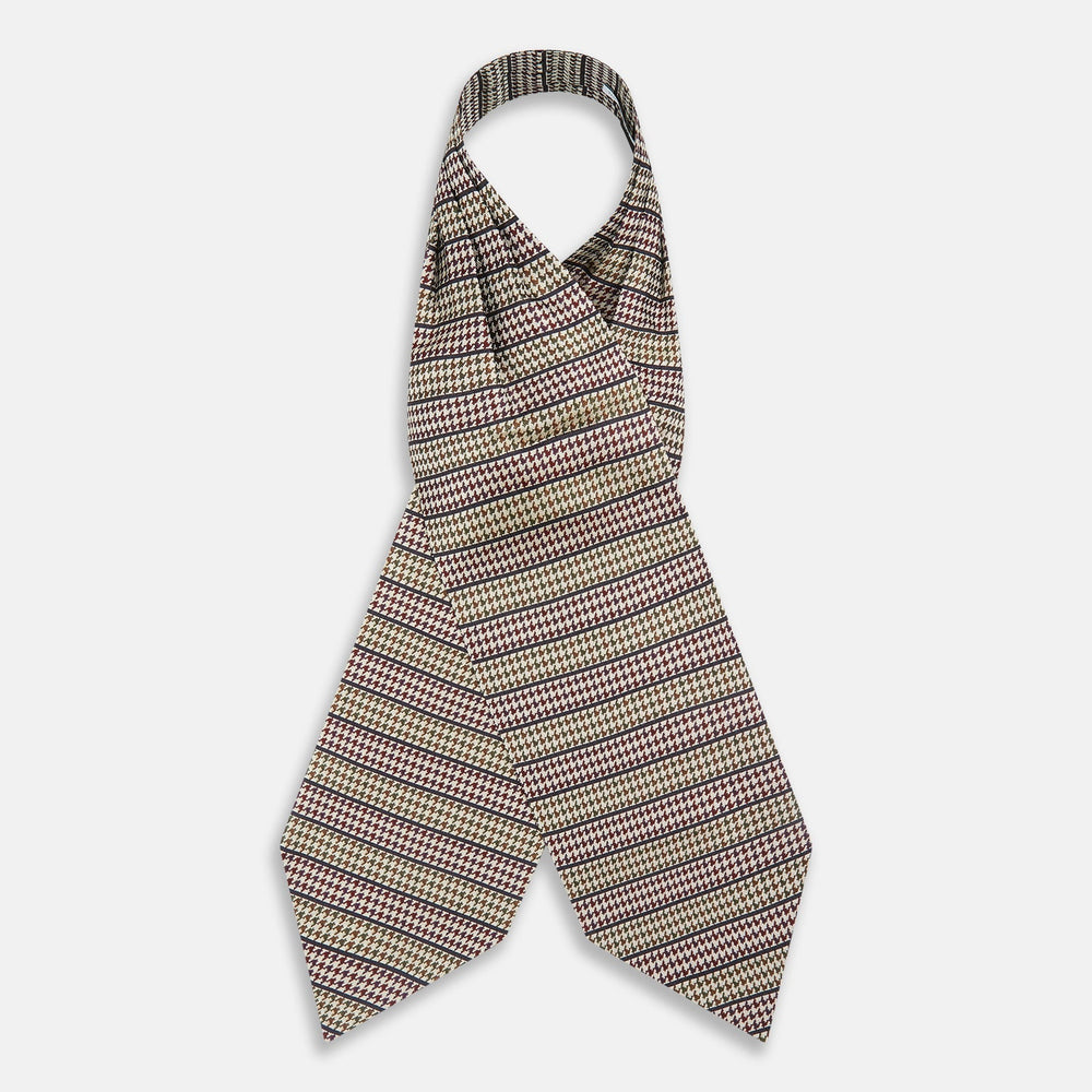 The Turnbull & Asser Brown Puppytooth Silk Cravat features a houndstooth pattern in brown, burgundy, and cream—evoking the refined elegance of a handmade accessory—displayed against a white background.