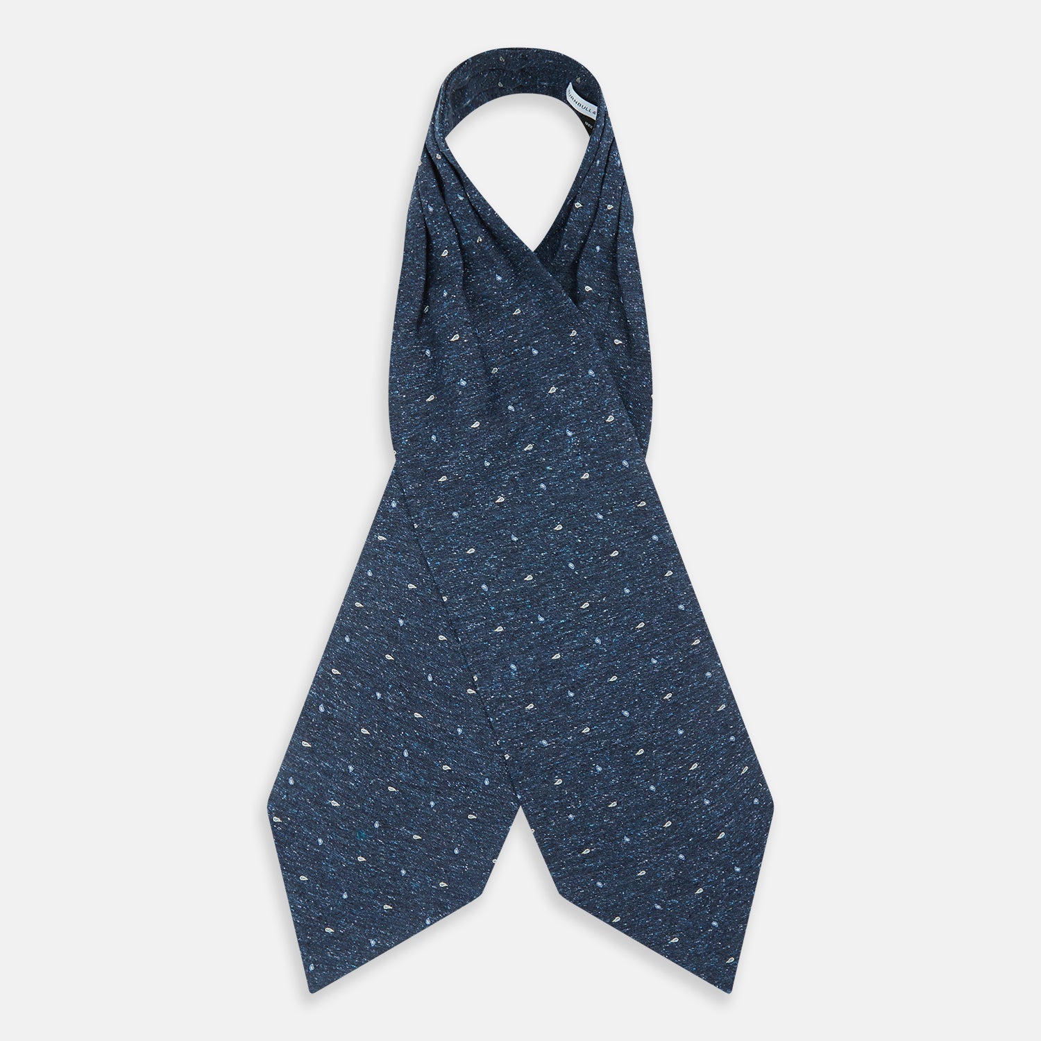 View 2 of product The Navy Micro Paisley Silk Cravat by Turnbull & Asser is a refined men's accessory, featuring subtle white paisley on silk—perfectly paired with a dark blue pocket square for an elegant formal look.