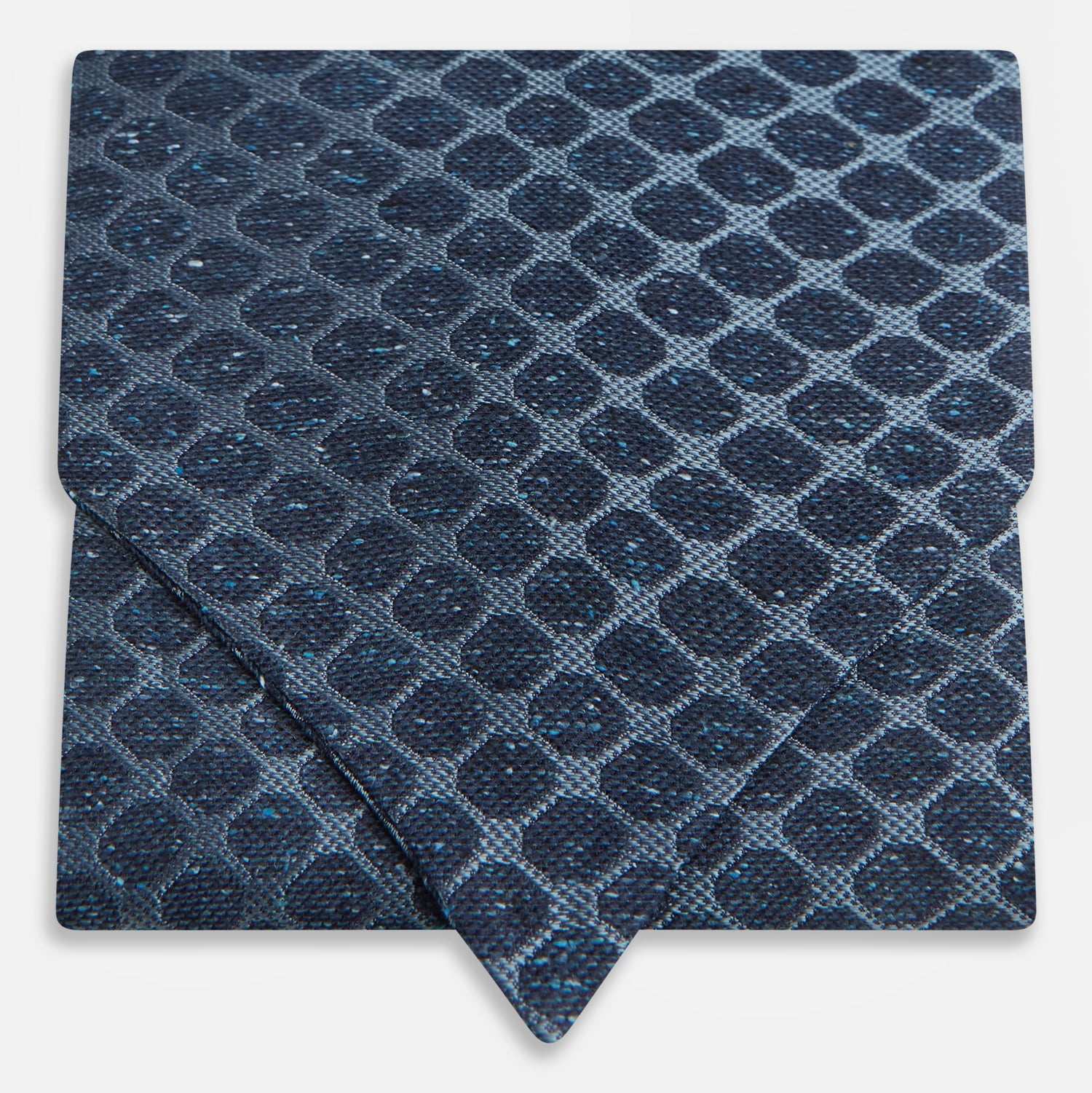 View 1 of product The Turnbull & Asser Navy Grid Silk Cravat features a textured hexagonal grid in dark and light blue on white—a refined, formal accessory perfect for any occasion.