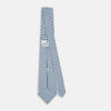 View 4 of product The Turnbull & Asser UK Great Gatsby Seven-Fold Silk Sky Tie, as seen on Jay Gatsby, is a light blue silk tie with a repeating floral medallion pattern in black, yellow, and red circles, shown rolled on a white background.