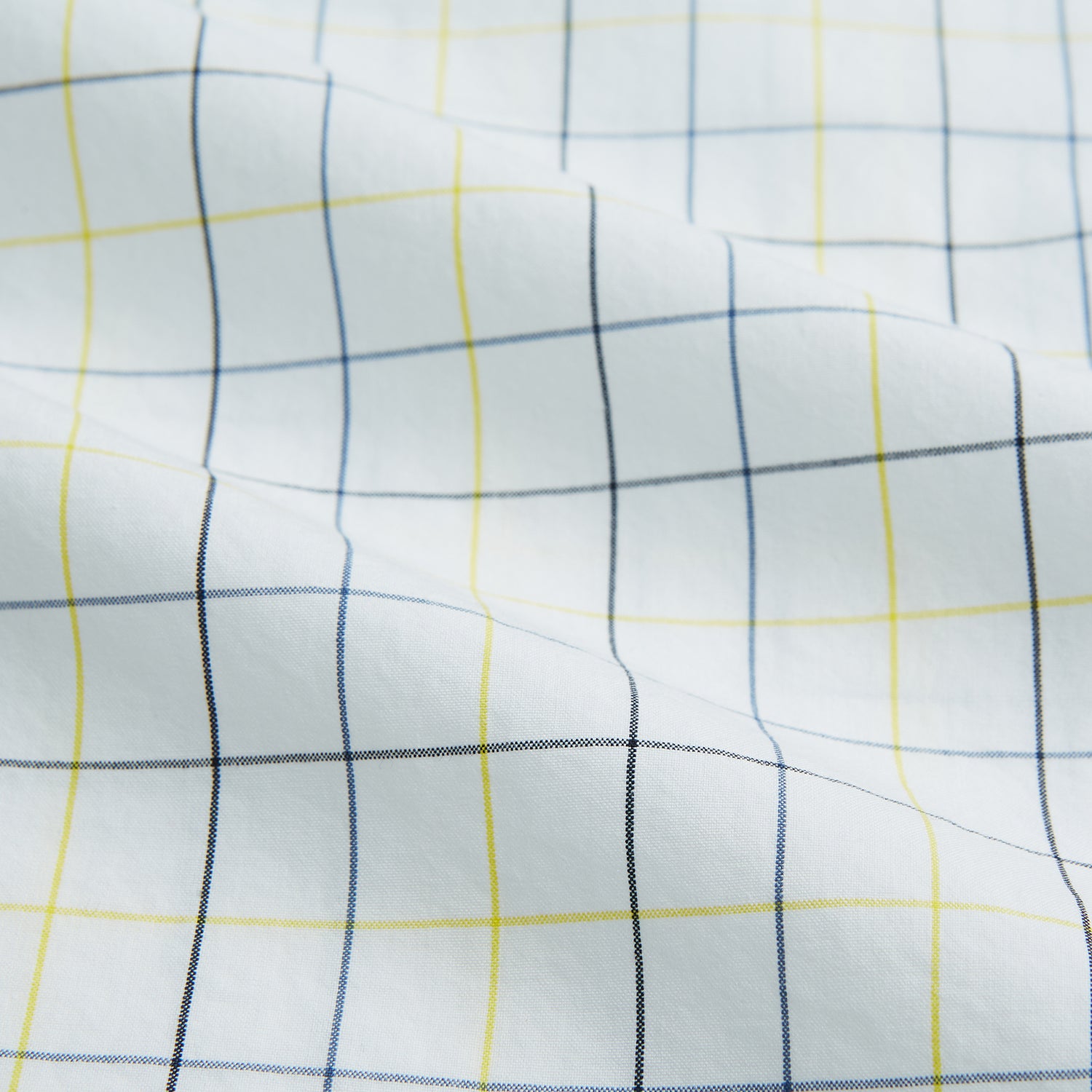 View 6 of product The Turnbull & Asser Yellow and Blue Grid Check Mayfair Shirt features a long-sleeve button-up design with a yellow and blue grid pattern, shown against a plain white background.