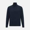 View 1 of product The Turnbull & Asser Navy Melange Half-Zip Cashmere Jumper features long sleeves, a high collar, and a half-zip front, showcased on a plain white background.