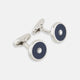 Turnbull & Asser's Navy Gemstone Circle Cufflinks feature round sterling silver with black enamel centers and a clear gemstone, shown on a white background.