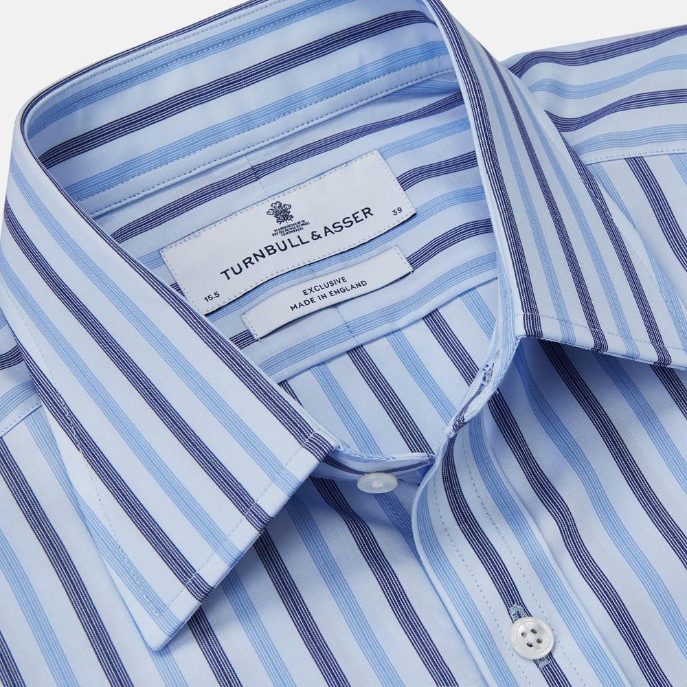The Turnbull & Asser Pale Blue Multi Stripe Cotton Regular Fit Whitby Shirt, with collar and cuffs, is shown laid flat on a white background.
