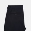 View 5 of product A pair of tailored, straight-leg Navy Linen Blend Henry Trousers by Turnbull & Asser with button and zip closure, displayed against a plain white background.