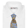 View 2 of product The Turnbull & Asser GGT92000 3062 06 OS is a rolled-up necktie with an intricate blue and yellow paisley pattern on a light blue background—a stylish accessory for any wardrobe.