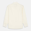 View 3 of product The Turnbull & Asser Tailored Fit Cream Cotton Shirt features a Kent collar and 3-button cuffs, shown against a plain white background.