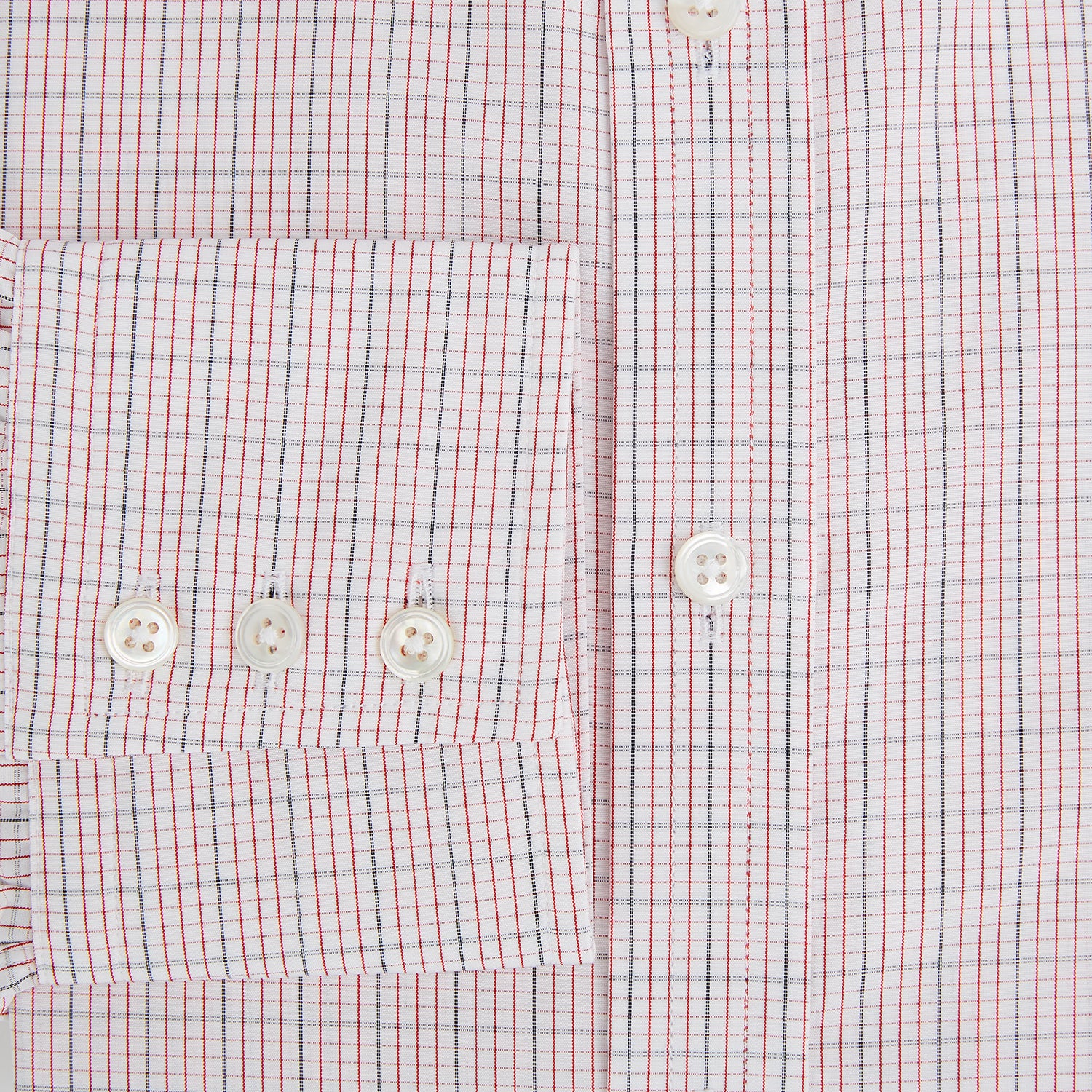 View 4 of product The Turnbull & Asser Red Micro Graph Check Mayfair Shirt is a long-sleeved, button-up Italian cotton shirt with a spread collar and buttoned cuffs, shown on a plain white background.