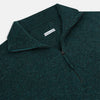 View 2 of product The Forest Green Melange Half-Zip Cashmere Jumper by Turnbull & Asser features a high collar and long sleeves, showcased against a plain white background.