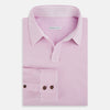 View 5 of product The Pink Rugby Polo Shirt by Turnbull & Asser features long sleeves, a collar, and V-neck opening in luxury cotton, shown flat on a white background.