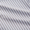 View 3 of product The Turnbull & Asser Pale Blue Multi Stripe Cotton Quin Pyjamas, featuring a long-sleeve button-up top and matching adjustable tie-waist pants, are neatly arranged on a white background.