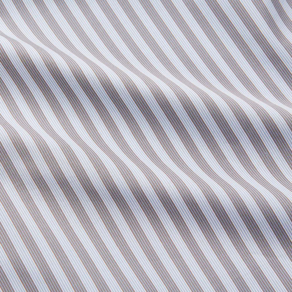 The Turnbull & Asser Pale Blue Multi Stripe Cotton Quin Pyjamas, featuring a long-sleeve button-up top and matching adjustable tie-waist pants, are neatly arranged on a white background.